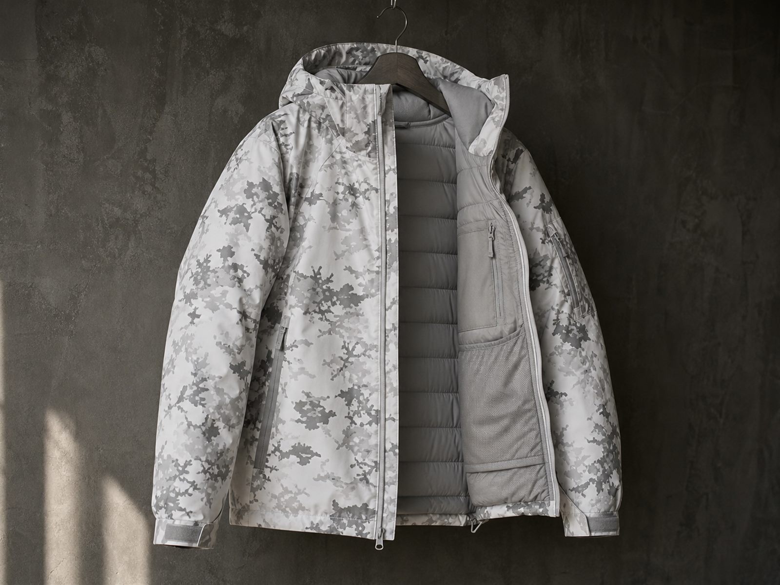Insulated tactical jacket with quilted fill construction and mapped insulation made for OEM buyers