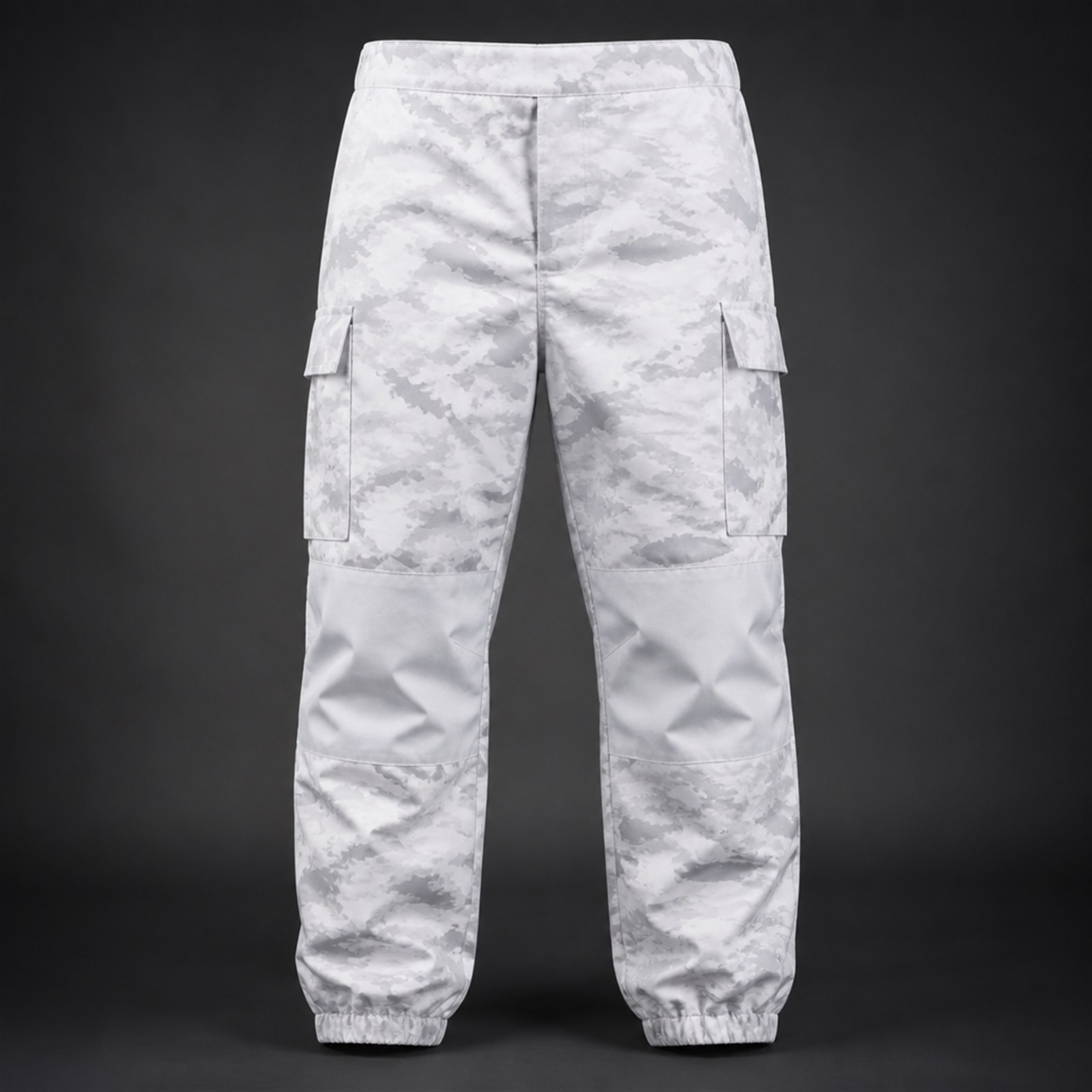 Waterproof winter tactical pants with high back rise, articulated reinforced knees and adjustable leg opening